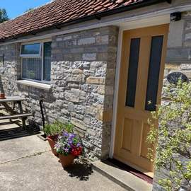 Photograph of our long courtyard running the full length of the property.