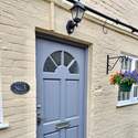 Photograph of the front door of Number 3. Our newly refurbished 2/3 bedroom character cottage.