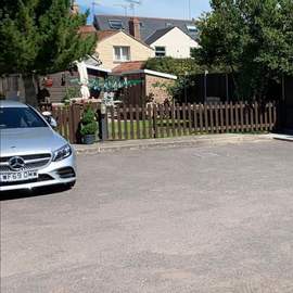 Photograph overlooking our private car situated at the rear of the property. Enough space to accomodate 6+ cars